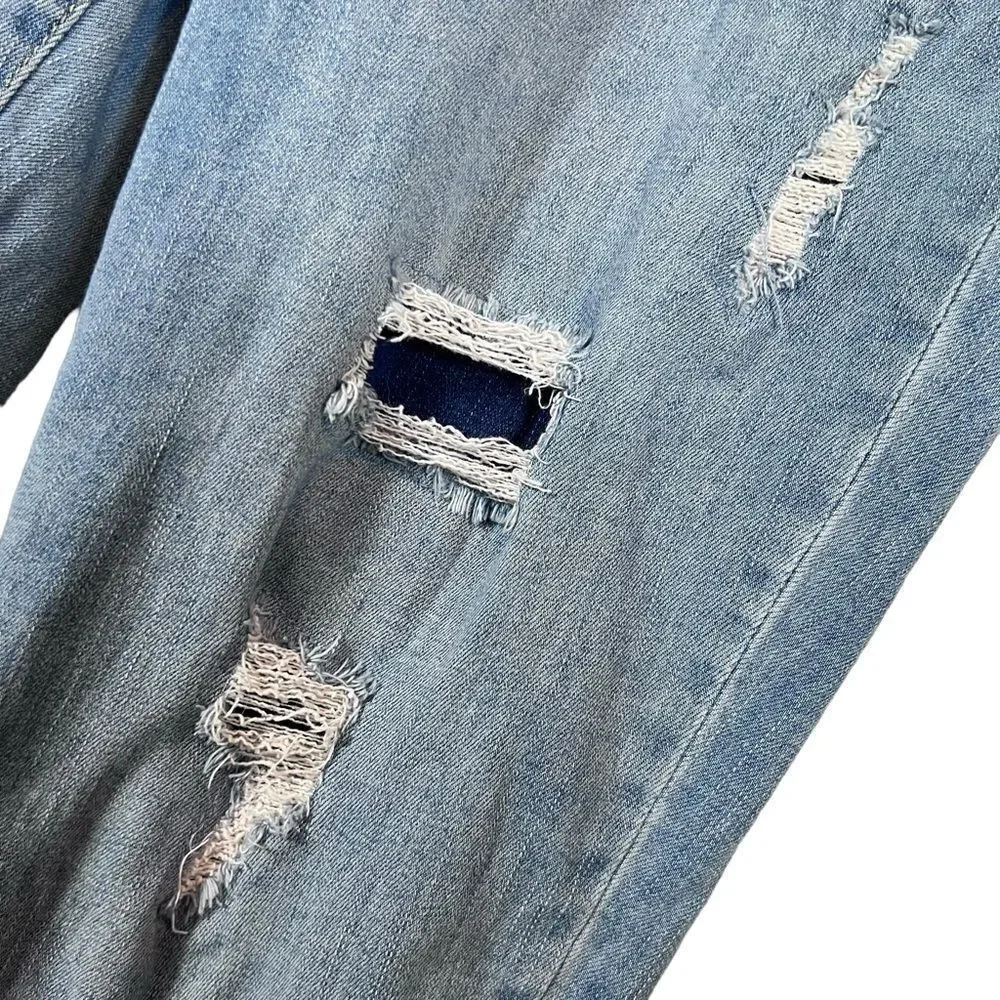 Chico's so slimming distressed ankle fit jeans.